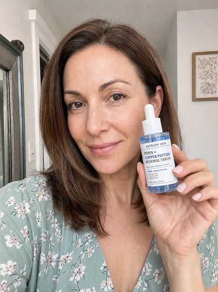 Elysium customer holding Copper Peptide Renewal Serum