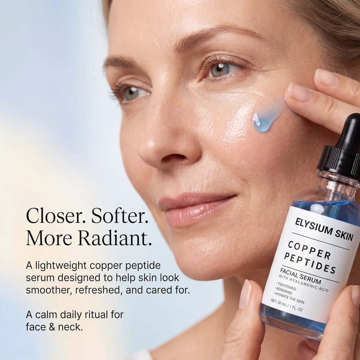 Woman applying Elysium serum to cheek